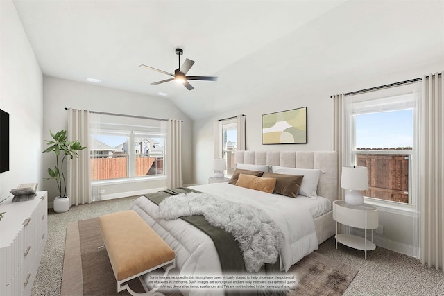 bedroom with multiple windows, ceiling fan, and lofted ceiling