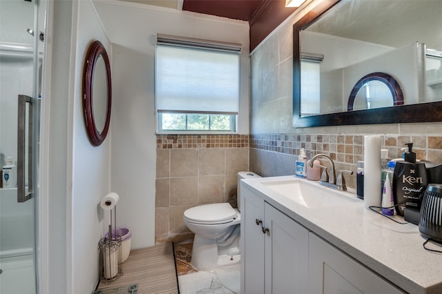 bathroom with tile walls, decorative backsplash, vanity, and toilet