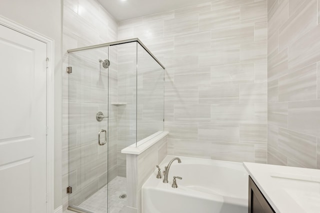 bathroom with vanity and plus walk in shower