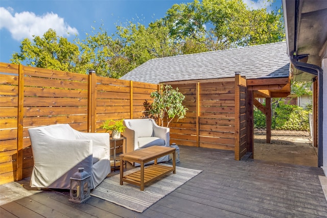 wooden deck featuring an outdoor hangout area