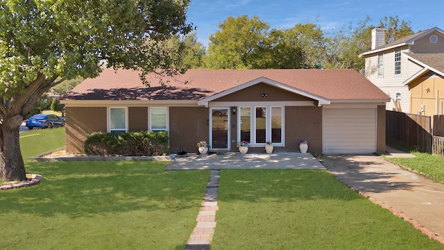 ranch-style house featuring a front yard