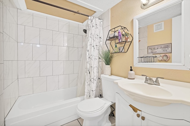 full bathroom featuring vanity, shower / bath combo with shower curtain, a textured ceiling, and toilet