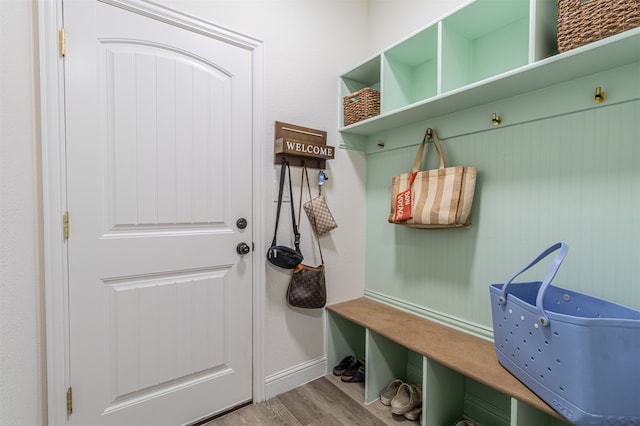 mudroom with light hardwood / wood-style flooring