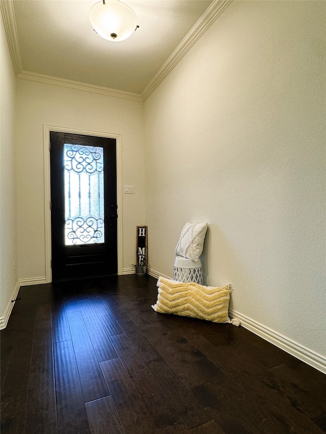 entryway with ornamental molding and dark hardwood / wood-style flooring