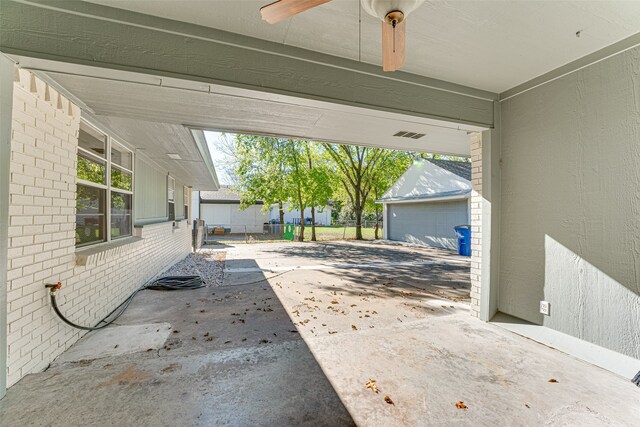 view of patio / terrace featuring ceiling fan