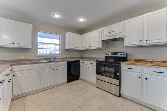 kitchen featuring black dishwasher, sink, stainless steel range with electric cooktop, and white cabinets