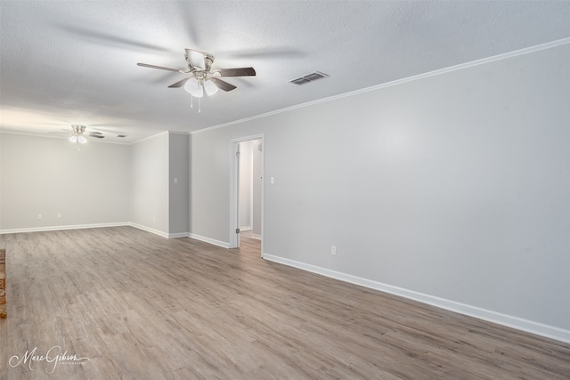 2011 Crabapple, Shreveport, LA 71118 - spare room with ceiling fan, crown molding, wood finished floors, and a textured ceiling