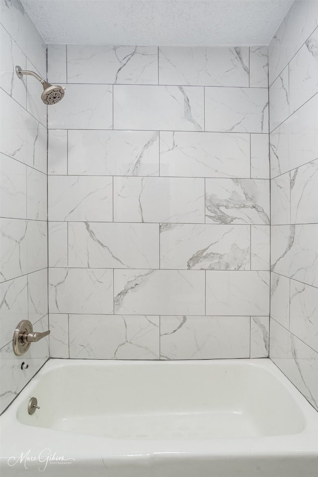 2011 Crabapple, Shreveport, LA 71118 - full bathroom with a textured ceiling and shower / bath combination