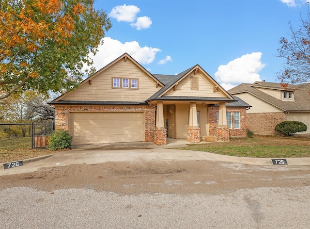 craftsman house with a garage