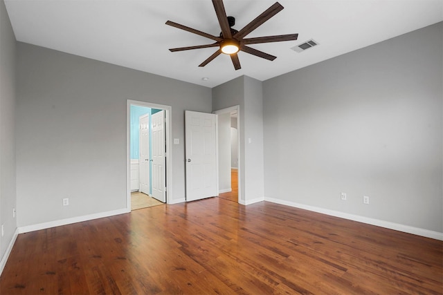 spare room featuring light wood-type flooring and ceiling fan