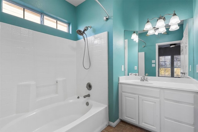 bathroom featuring tile patterned flooring, vanity, shower / washtub combination, and plenty of natural light