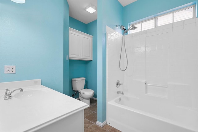 full bathroom with bathtub / shower combination, vanity, tile patterned flooring, and toilet