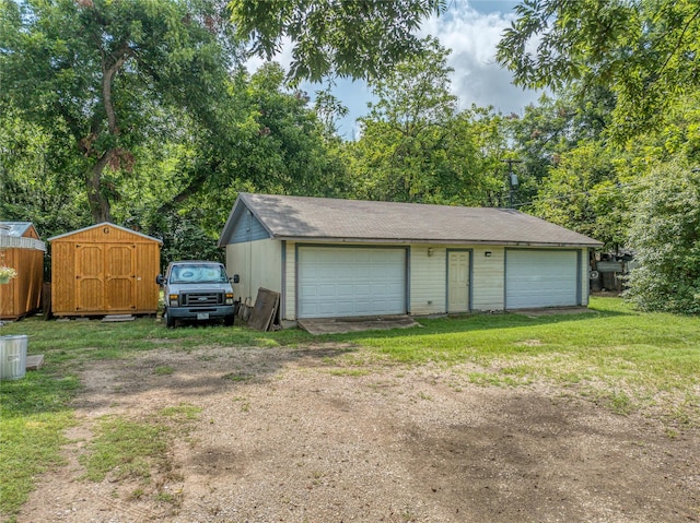 702 S Barrett Ave, Denison, TX 75020 - detached garage with a shed