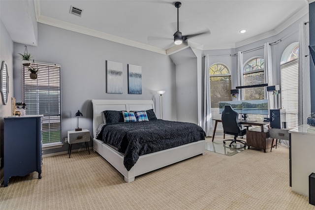 bedroom with ceiling fan, crown molding, and light colored carpet