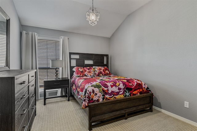 carpeted bedroom featuring lofted ceiling