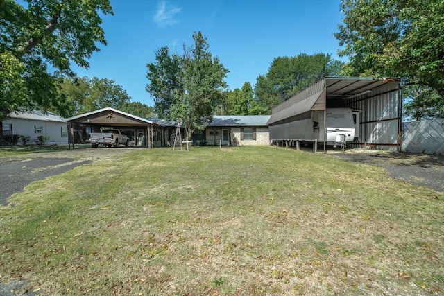 view of yard featuring a carport