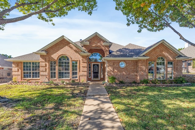 view of front of property with a front lawn