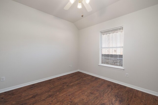 unfurnished room featuring ceiling fan, dark wood-type flooring, and vaulted ceiling