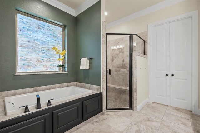 bathroom featuring crown molding and independent shower and bath