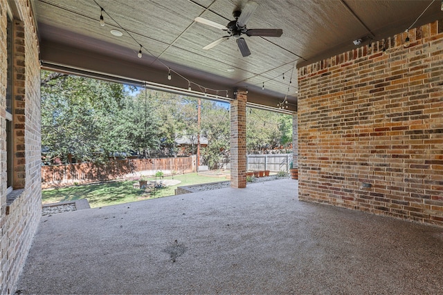 view of patio featuring ceiling fan