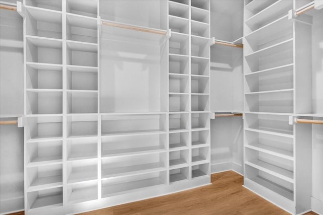 walk in closet featuring hardwood / wood-style floors