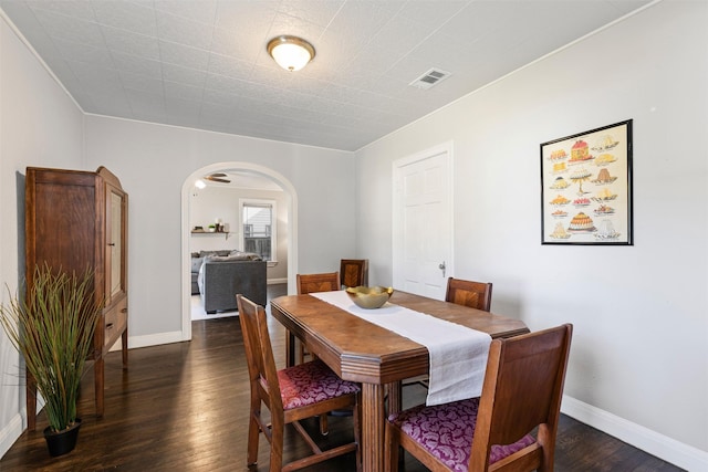 dining area featuring dark hardwood / wood-style flooring