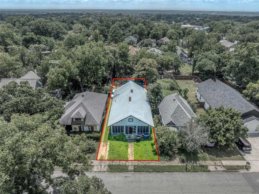 708 W Texas St, Denison, TX 75020 - view from above of property featuring property boundaries highlighted and a forest