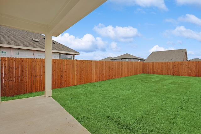 view of yard featuring a fenced backyard