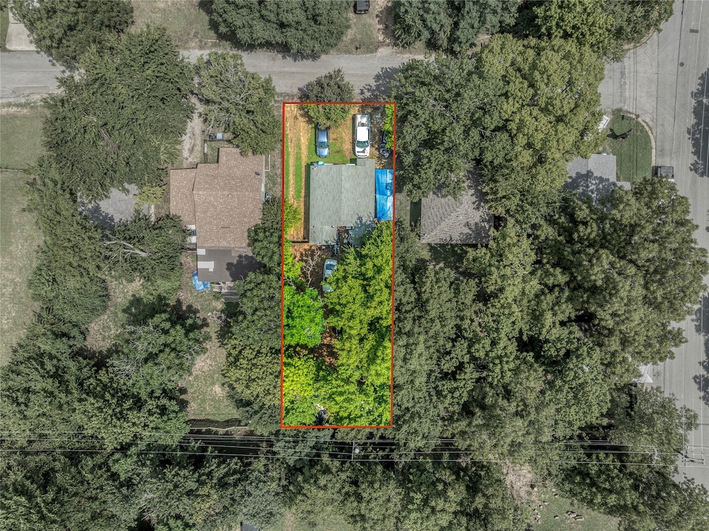 614 W Collins St, Denison, TX 75020 - aerial view of property and surrounding area featuring property parcel outlined