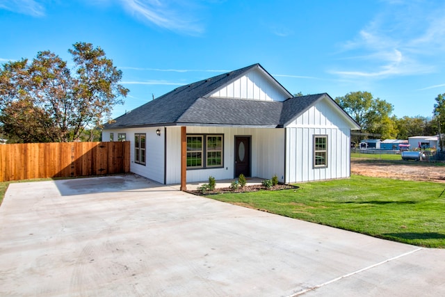 exterior space with a front lawn