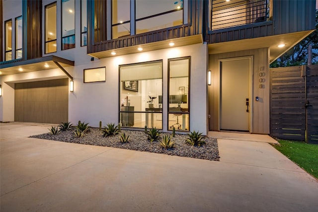 view of exterior entry featuring a garage