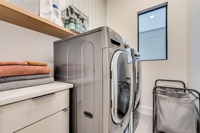 laundry area featuring washer and clothes dryer