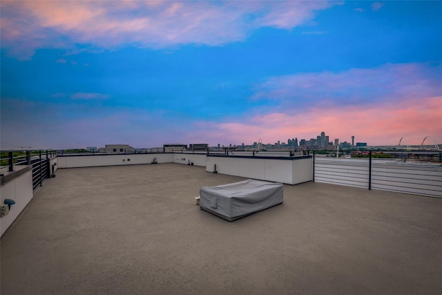 view of patio terrace at dusk