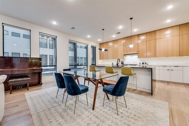 dining area featuring light hardwood / wood-style flooring