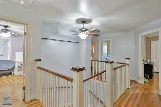 hall with light hardwood / wood-style floors