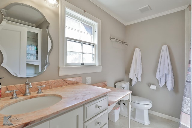 bathroom featuring vanity, tile patterned flooring, toilet, and ornamental molding