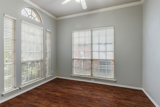 spare room with dark hardwood / wood-style flooring, ceiling fan, and crown molding