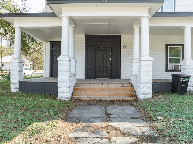 doorway to property with a porch