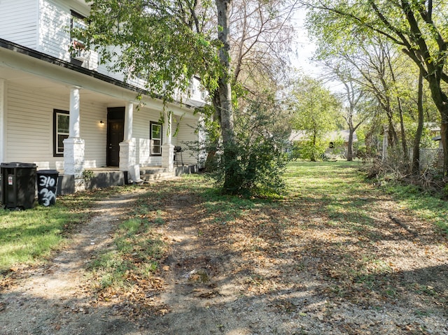 view of yard featuring a porch