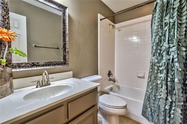 full bathroom featuring shower / bath combo, toilet, and vanity