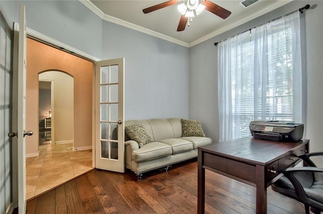 office with french doors, ceiling fan, crown molding, and hardwood / wood-style floors