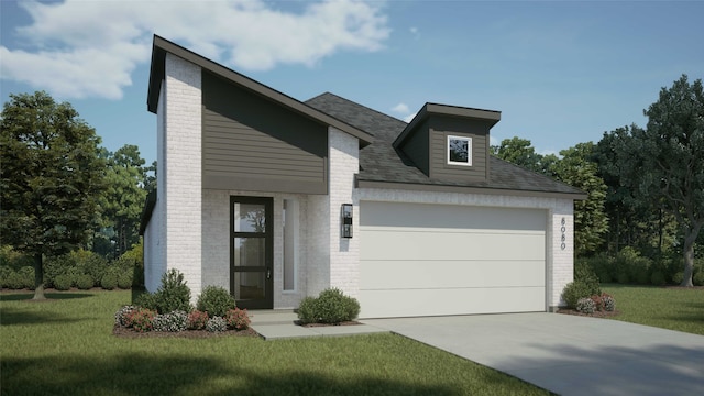 view of front of property featuring a garage and a front yard