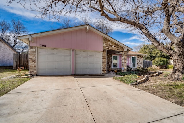 single story home with a garage