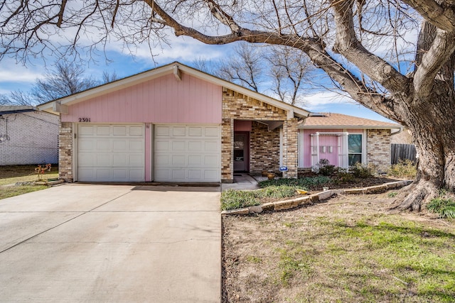 ranch-style home with a garage