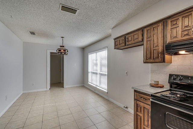 kitchen featuring tasteful backsplash, a textured ceiling, light tile patterned floors, black electric range, and hanging light fixtures