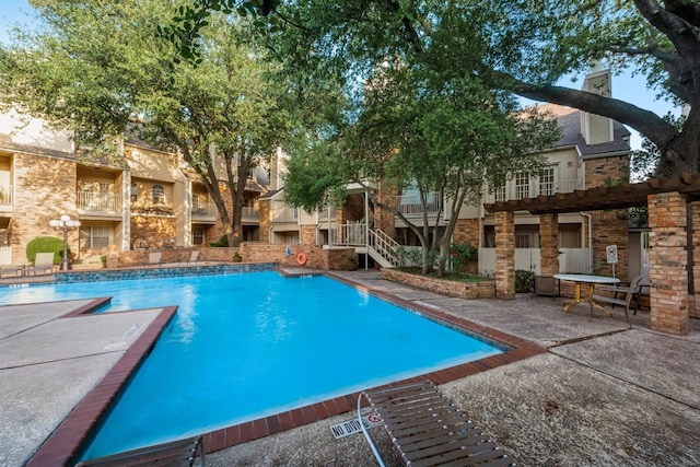 view of pool featuring a pergola