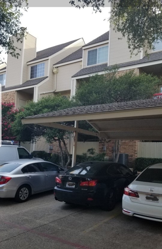 view of car parking featuring a carport