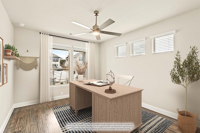 office area featuring baseboards, a ceiling fan, and dark wood-style flooring