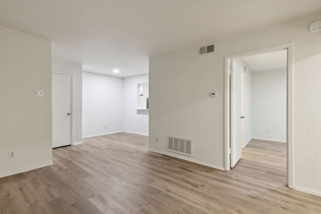 empty room featuring light hardwood / wood-style floors