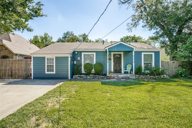 single story home with a front lawn